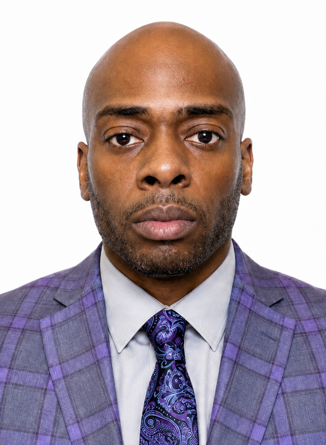Karim J. Alexander in a purple suit